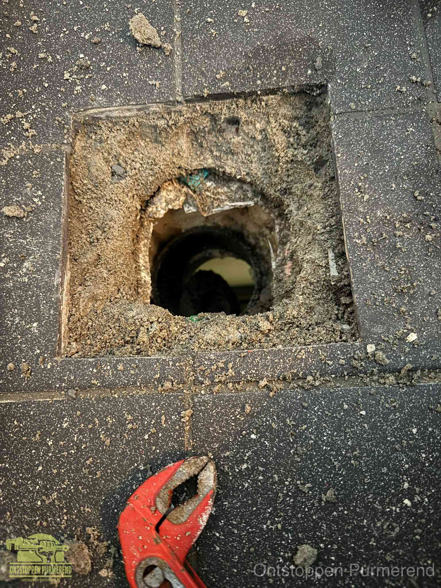 Rioolputje erfgrens eigendom in Purmerend